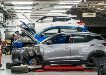 Cars being repaired in a workshop